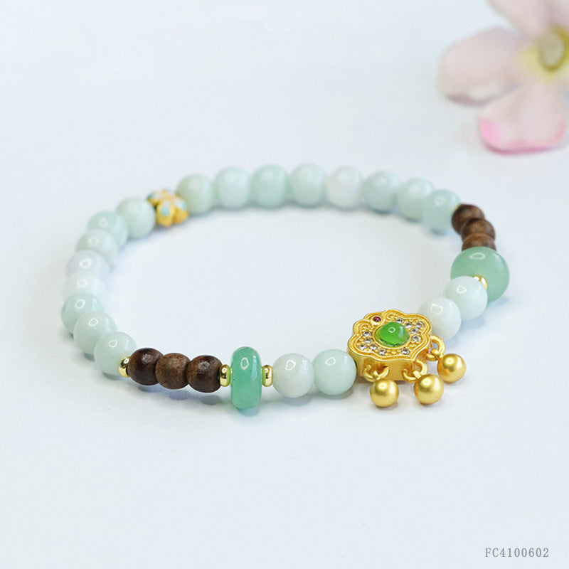 Burmese Grade A Jadeite Beaded Bracelet with Agarwood Accents and Ruyi Lock Charm