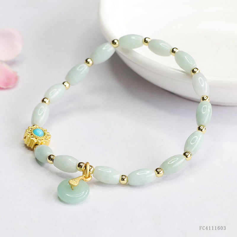 Burmese Grade A Jadeite Rice Bead Bracelet with Ping An Kou Charm and Turquoise Accent